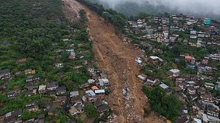 An aerial view shows neighborhood affected by landslides in Petropolis, Brazil, Wednesday, Feb. 16, 2022.