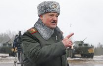 Belarusian President Alexander Lukashenko speaks to journalists at the Osipovichi training ground.