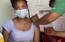 A woman is vaccinated in Cape Town, South Africa