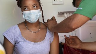 A woman is vaccinated in Cape Town, South Africa