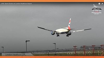 Presenter Jerry Dyer is keeping up a running commentary on arrivals at Heathrow.