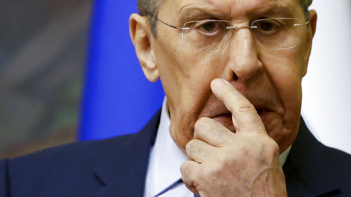 Russian Foreign Minister Sergey Lavrov gestures during a joint news conference