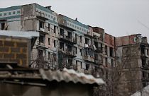 Donetsk bölgesinde çatışmalar nedeniyle kullanılmaz hale gelen bir bina (arşiv)