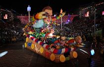 Floats and dancers taking part in Nice Carnival
