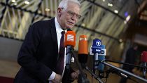 Josep Borrell speaks with the media as he arrives for the EU foreign ministers meeting in Brussels.