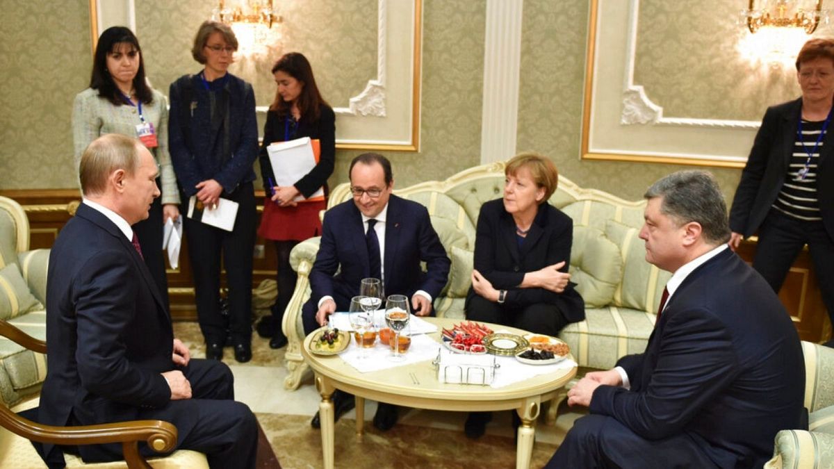 MINSK II, Russian and French Presidents , German Chancellorand Ukrainian President talk in Minsk, Feb. 2015