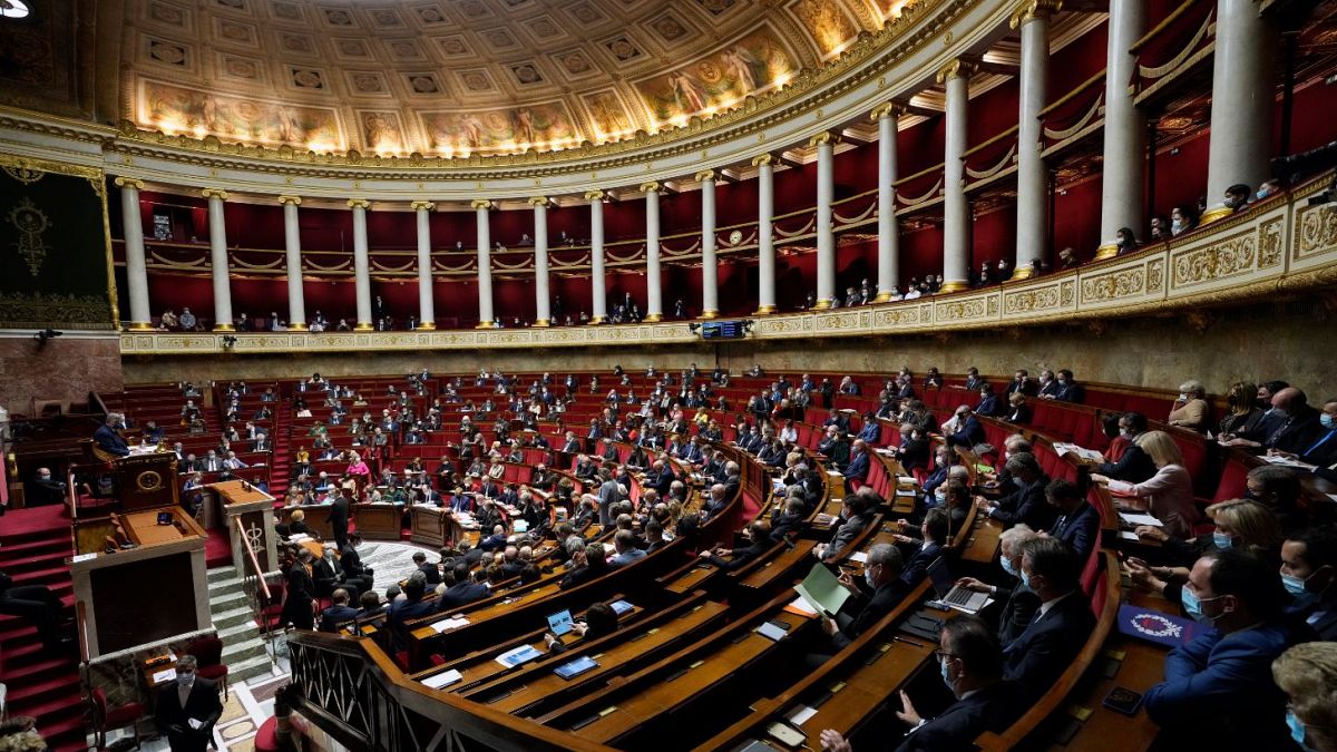 Parliament members attend a session of questions to the Government at the French National Assembly in Paris.