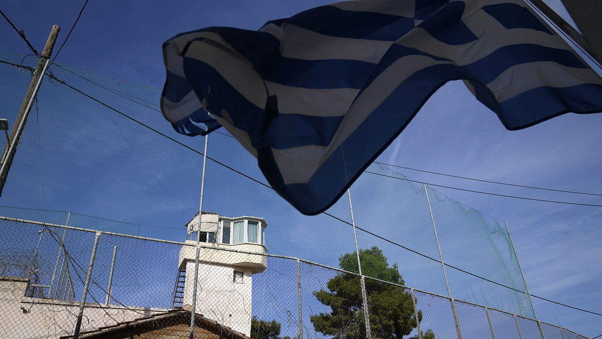 A Greek flag waves outside a prison on the northeastern Aegean island of Chios
