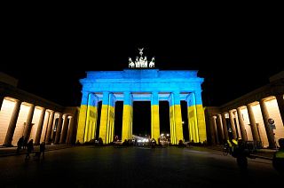 Berlin’s Brandenburg Gate displayed the yellow and blue colours of Ukraine in an act of solidarity