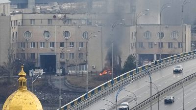 Smoke and flame rise near a military building after an apparent Russian strike in Kyiv