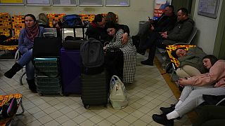 People from Ukraine, rest at a train station that was turned into an accommodation center in Przemysl, Poland