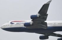 A British Airways Boeing 747 does a flypast over London Heathrow airport.