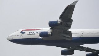 A British Airways Boeing 747 does a flypast over London Heathrow airport.