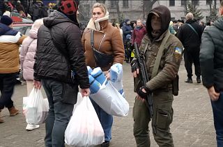 Ukrainian men and women join the fight in Dnipro