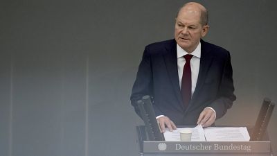 German Chancellor Olaf Scholz delivers a speech on the Russian invasion of the Ukraine during a meeting of the