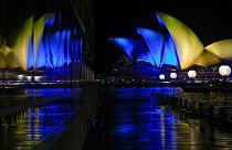 The sails of the Opera House are illuminated with the colors of Ukraine's national flag on Feb 28, 2022, in solidarity with the country's people and government 