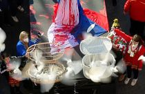 Doves released during a protest at the Cologne Carnival against the Russian attack