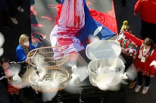 Doves released during a protest at the Cologne Carnival against the Russian attack