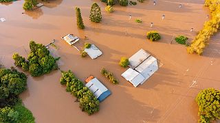 Water floods streets and houses in Maryborough, Australia, Monday, Feb. 28, 2022.