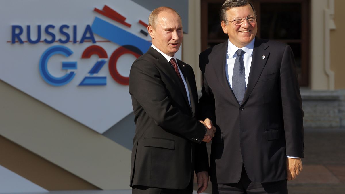 Vladimir Putin shakes hands with European Commission President Jose Manuel Barroso at a G-20 summit in St. Petersburg in 2013.