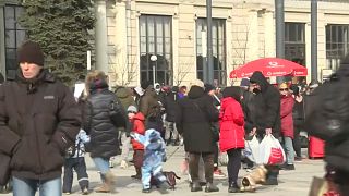 Thousands of refugees arrive at a train station in Lviv, Ukraine. 