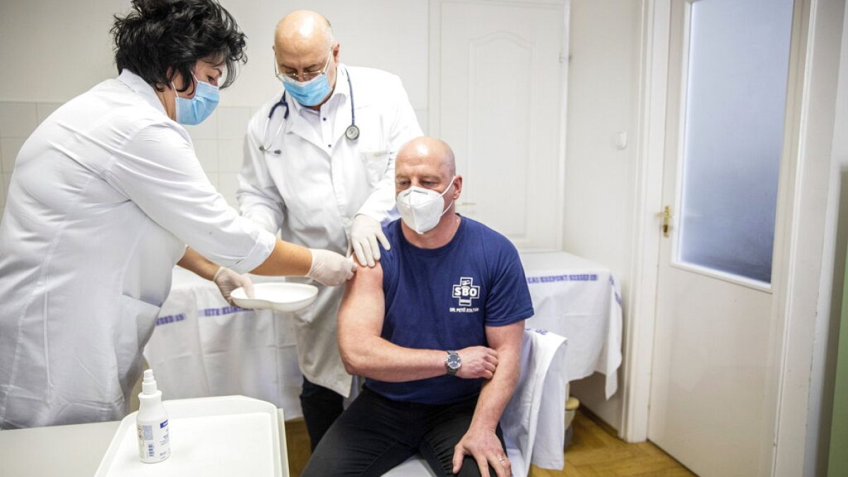 FILE: gettting vaccinated at the university in Szeged, Hungary, Feb. 24, 2021. (Tibor Rosta/MTI via AP)