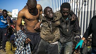 Hundreds of migrants scale fence in Spain's Melilla enclave for second day