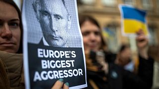 People take part in a protest against the Russian invasion of Ukraine, in Vilnius, Lithuania, Saturday, Feb. 26, 2022