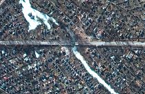 This satellite image provided by Maxar Technologies shows destroyed bridge and homes in Chernihiv, Ukraine on Feb. 28, 2022.