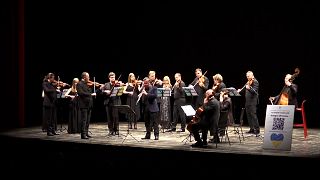 Musicians in a Ukrainian chamber ensemble stuck in Italy after the Russian invasion of their homeland hold back their tears as they play for peace