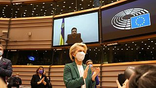 EC President Ursula von der Leyen applauds after an address by Ukraine's President Volodymyr Zelenskyy at the European Parliament