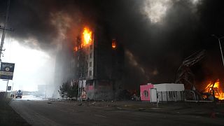 A building burns after shelling in Kyiv, Ukraine, Thursday, March 3, 2022