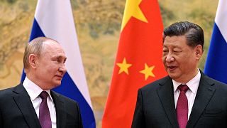 Rusya Devlet Başkanı Vladimir Putin (sol), Çin Devlet Başkanı Şi Cinping