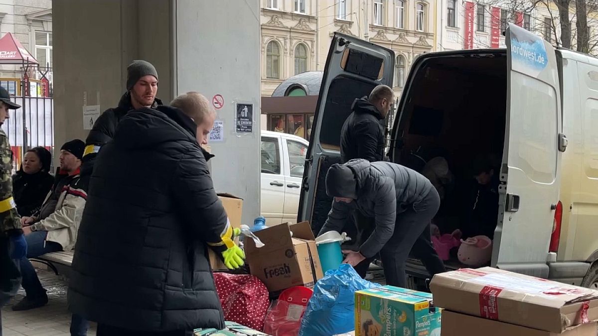Volunteers sort donations at a humanitarian centre in Lviv, western Ukraine