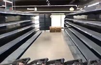 Empty supermarket shelves were seen in Nova Kakhovka, a Russian-occupied city in the Kherson Oblast region of southern Ukraine, on Tuesday, March 8, 2022.