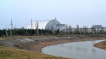 A picture taken on April 13, 2021 shows the giant protective dome built over the sarcophagus covering the destroyed fourth reactor of the Chernobyl Nuclear Power Plant.