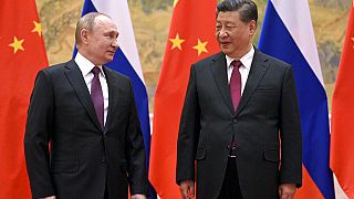 Chinese President Xi Jinping, right, and Russian President Vladimir Putin pose for a photo prior to their talks in Beijing, China, Friday, Feb. 4, 2022.