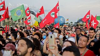 People attend Brazilian musician Caetano Veloso's performance during a demo in defense of Earth and the environment and against the environmental policies of Bolsonaro.