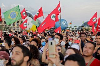People attend Brazilian musician Caetano Veloso's performance during a demo in defense of Earth and the environment and against the environmental policies of Bolsonaro.
