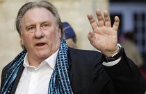 June 25, 2018, French actor Gerard Depardieu waves as he arrives at the Town Hall in Brussels