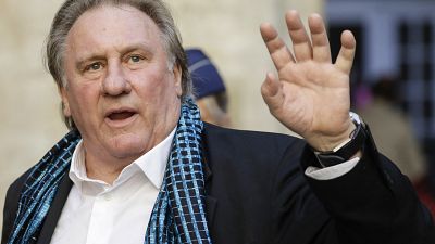 June 25, 2018, French actor Gerard Depardieu waves as he arrives at the Town Hall in Brussels June 25, 2018, French actor Gerard Depardieu waves as he arrives at the Town Hall in Brussels