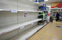 Empty shelves which previously held toilet paper are pictured at a supermarket in Cleckheaton, West Yorkshire during the COVID-19 pandemic.