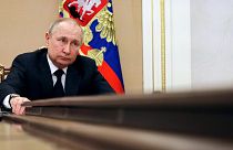 Russian President Vladimir Putin chairs a meeting with members of the government via teleconference in Moscow, Thursday, March 10, 2022.