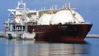 A Qatari liquid natural gas (LNG) tanker ship being loaded up with LNG at Raslaffans Sea Port, northern Qatar.