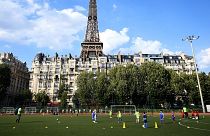 Youths take part in a football training session in Paris.