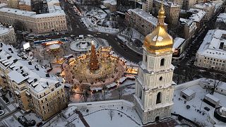 Snow covers the city centre with a Christmas tree, St. Sophia Cathedral in Kyiv, December 2021