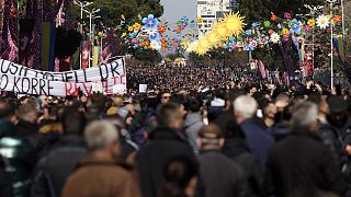 Protesters gather during an anti-government rally in Tirana, Albania, Saturday, 12 March 2022.