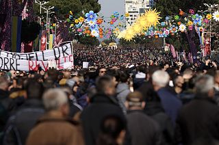 Protesters gather during an anti-government rally in Tirana, Albania, Saturday, 12 March 2022.