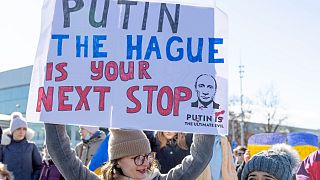 Demonstrators protest Russia's massive military operation against Ukraine during a rally on the place of the United Nations in Geneva, Switzerland, February 26, 2022..