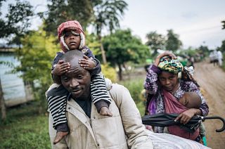 Displaced people flee the scene of an attack in DRC.